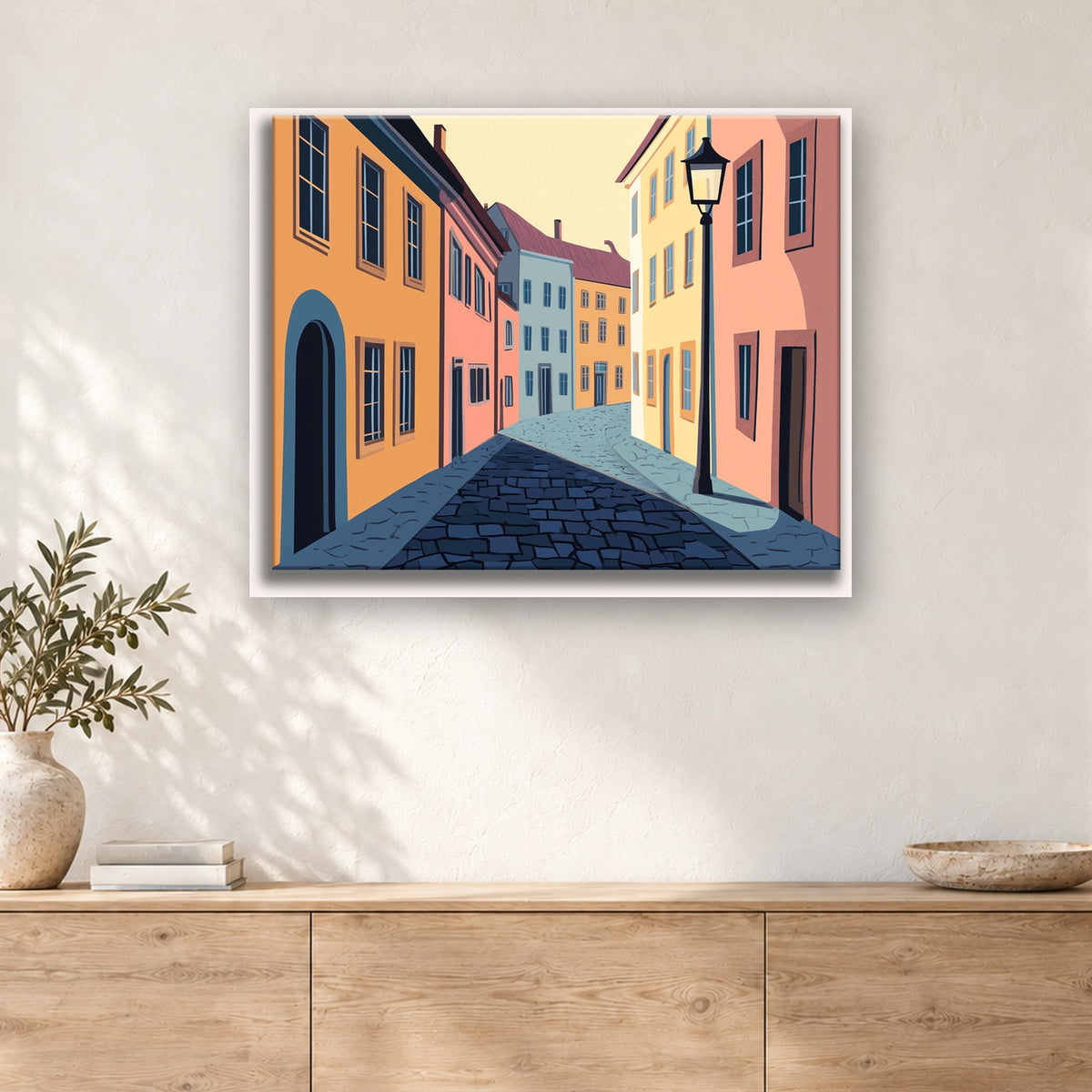 Tableau peinture par numéro Ruelle aux Façades Pastel accroché dans un intérieur décoré, Maison Artsen