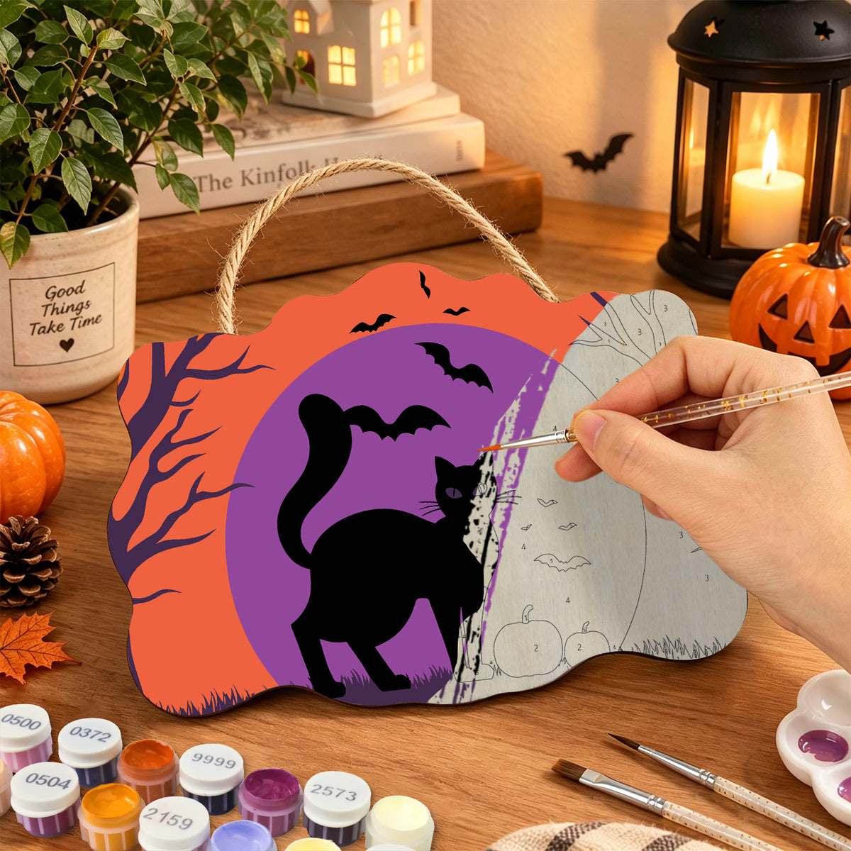 Pancarte Chat Noir en Silhouette en cours de peinture, pinceau à la main — Maison Artsen
