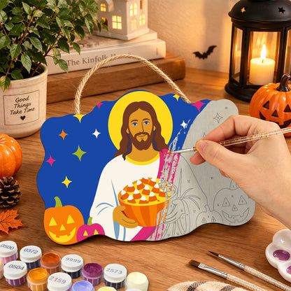Pancarte Christ à la Tarte en cours de peinture, pinceau à la main — Maison Artsen