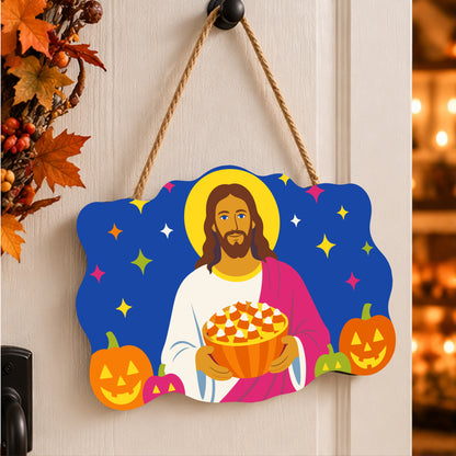 Pancarte Christ à la Tarte peinte et accrochée à une porte d'entrée décorée pour Halloween — Maison Artsen