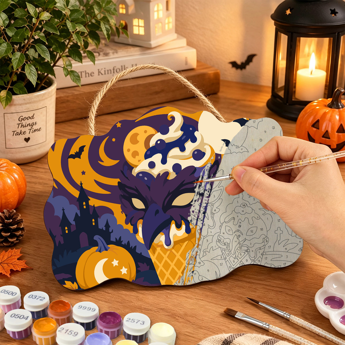 Pancarte Glace Monstre sous la Lune en cours de peinture, pinceau à la main — Maison Artsen