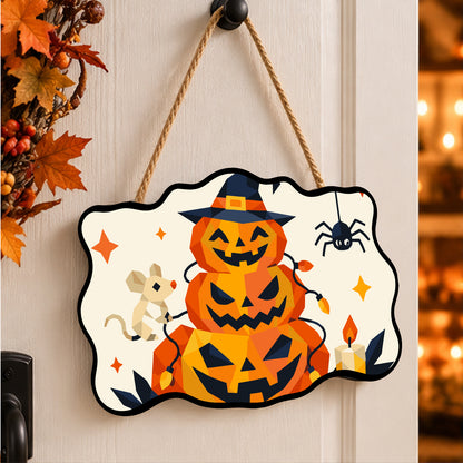 Pancarte Pyramide de Citrouilles peinte et accrochée à une porte d'entrée décorée pour Halloween — Maison Artsen